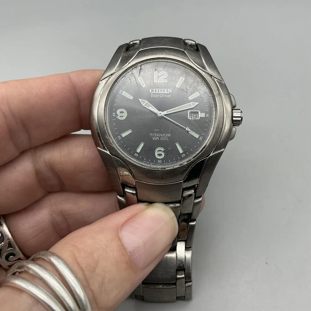 Citizen Eco-Drive Titanium Mens Watch 40mm Black Dial WR 100 E111-K006368 7.25